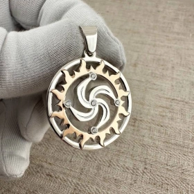 Символ Рода в золотом солнце с камнями